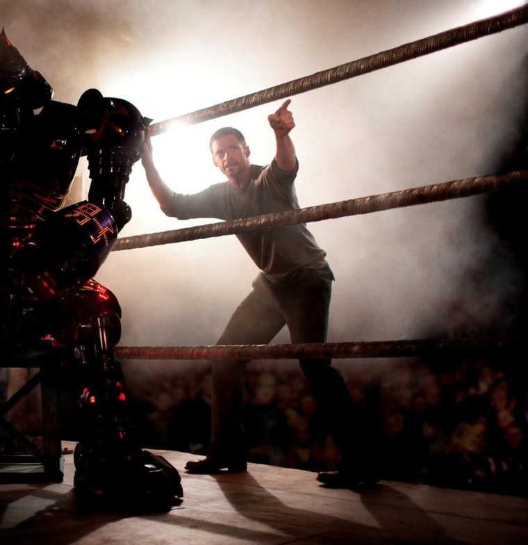 Hugh Jackman in Real Steel (2011) 
Set in the near future, where robot boxing is a top sport, a struggling promoter feels he's found a champion in a discarded robot. During his hopeful rise to the top, he discovers he has an 11-year-old son who wants to know his father.